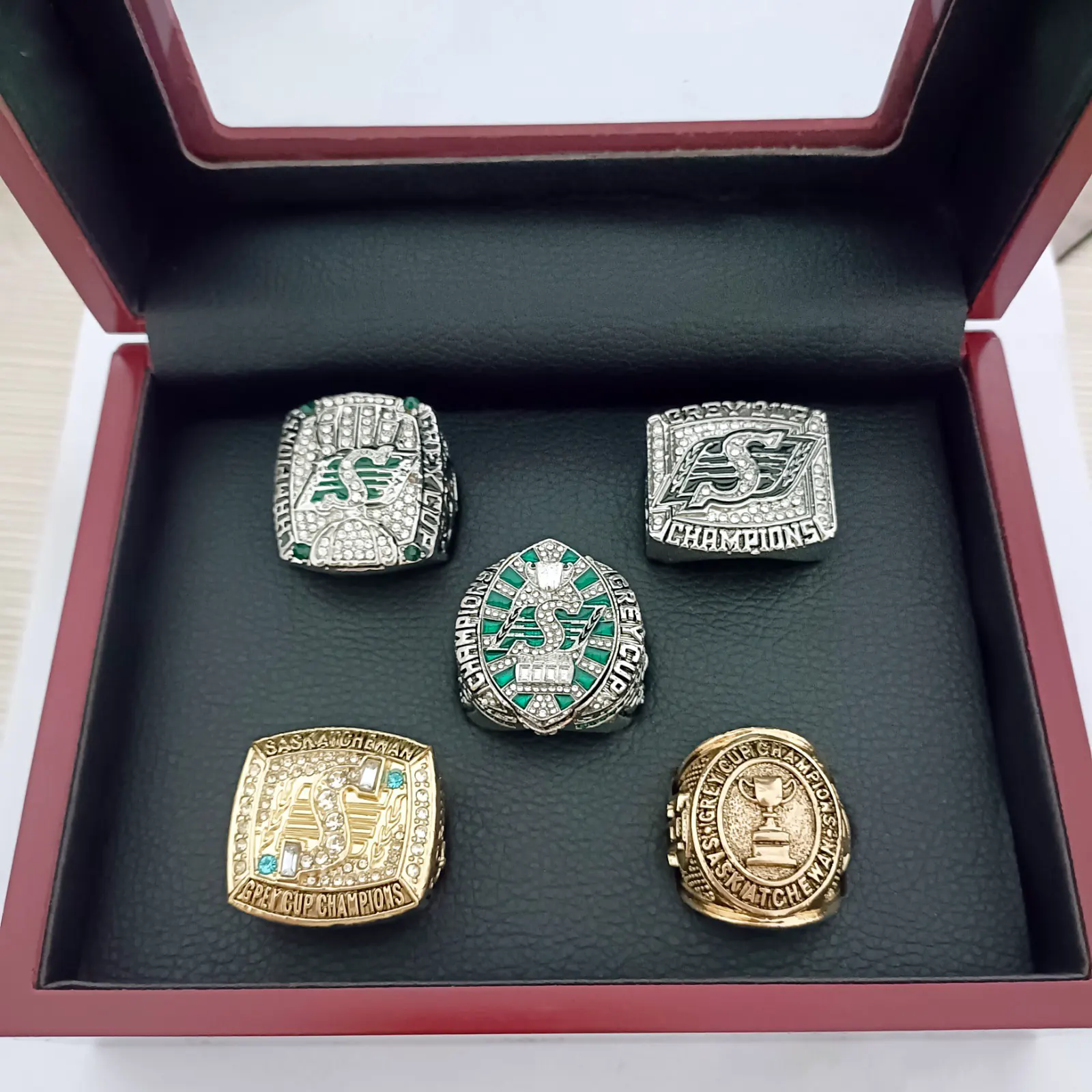 5 Saskatchewan Roughriders Grey Cup championship rings set Grey Cup rings collectible 5 Saskatchewan Roughriders Grey Cup championship rings set Grey Cup rings collectible